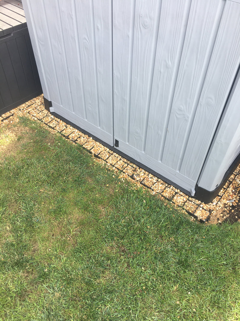 Load image into Gallery viewer, Plastic shed sitting on top of recycled plastic shed base grids